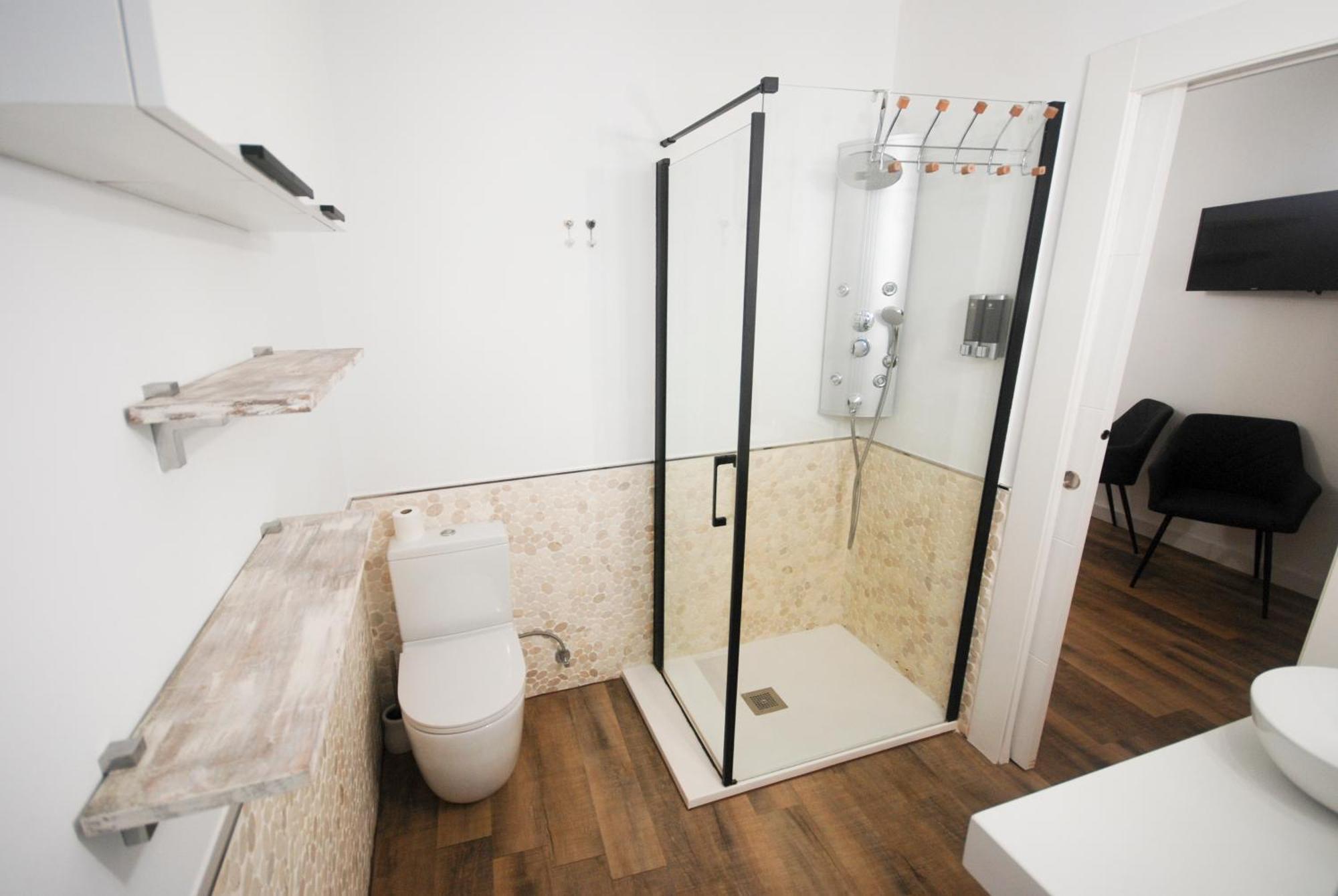 Conil Apartamentos La Dama Y El Vagabundo โกนิล เด ลาฟรอนเตรา ภายนอก รูปภาพ